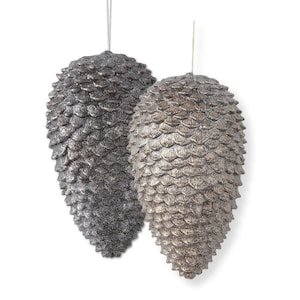 May include: Two decorative pine cone ornaments, one silver and one gold, with a textured, scaly surface.