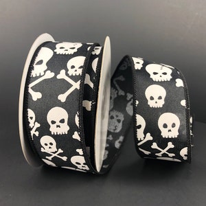 1.5” x 10 YD wired black satin with white skulls & crossbones halloween ribbon, 58201-09-21