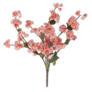 May include: A bouquet of artificial peach-colored cherry blossoms with green leaves. The stems are brown and bundled together.