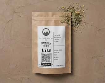May include: A brown paper pouch containing Damiana herb, labeled Sacred Plant Co, 1/2 LB, with a QR code and text listing tasting notes of woodsy, mint, alfalfa, and orange. A small pile of dried green herbs sits on the top right corner of the pouch.