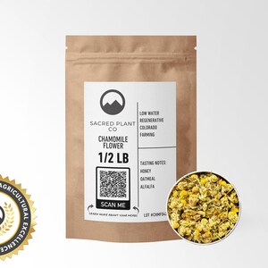 A 1/2 LB resealable kraft bag of sustainably sourced Chamomile Flower with dried blossoms displayed. Perfect for relaxation, digestion, and sleep support. Ethically harvested with a focus on premium quality and eco-friendly packaging.