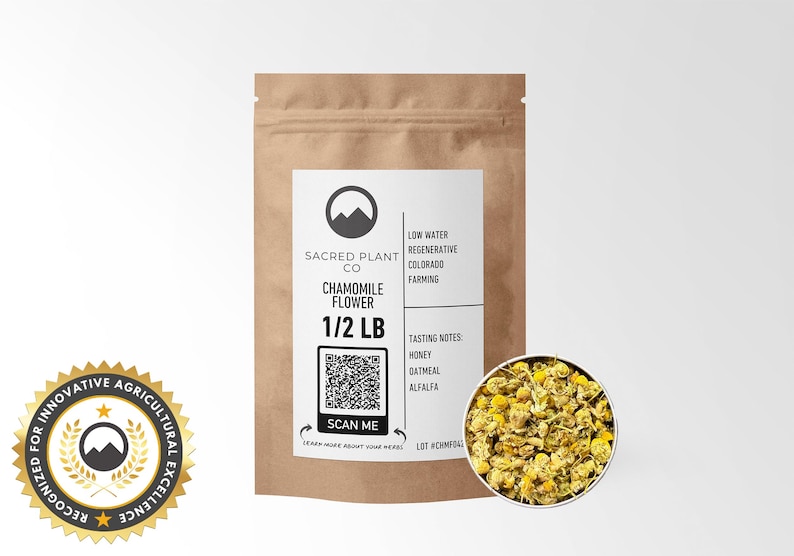 A 1/2 LB resealable kraft bag of sustainably sourced Chamomile Flower with dried blossoms displayed. Perfect for relaxation, digestion, and sleep support. Ethically harvested with a focus on premium quality and eco-friendly packaging.