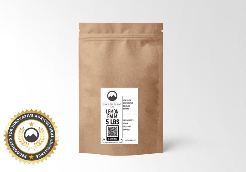 A larger kraft paper bag labeled Sacred Plant Co Lemon Balm 5 LBS, ideal for bulk purchases. Features low water regenerative Colorado farming and tasting notes of lemon, spearmint, and camphor.