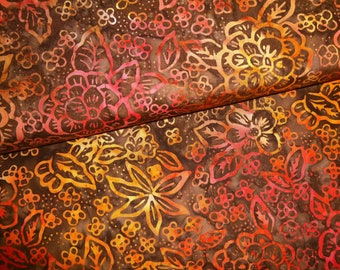 Stoff De la Sol Batiks braun-orange-rot Blumen