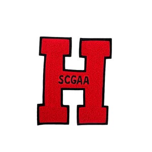 May include: Red felt letter H with black outline and the text "SCGAA" inside.