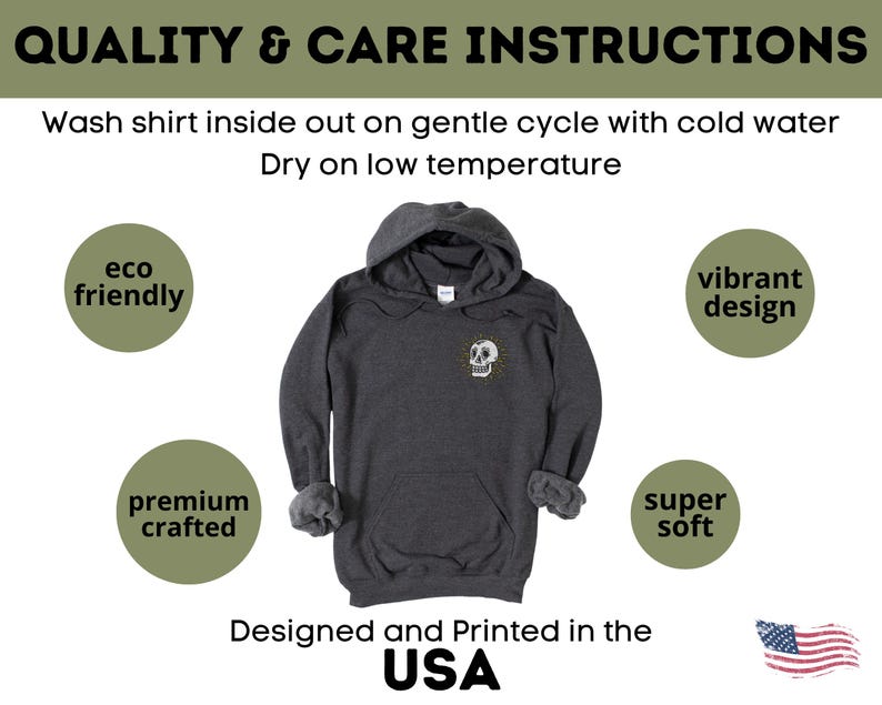 May include: A dark gray hooded sweatshirt with a white skull design on the front. The sweatshirt is made from eco-friendly materials and is super soft. It is designed and printed in the USA.