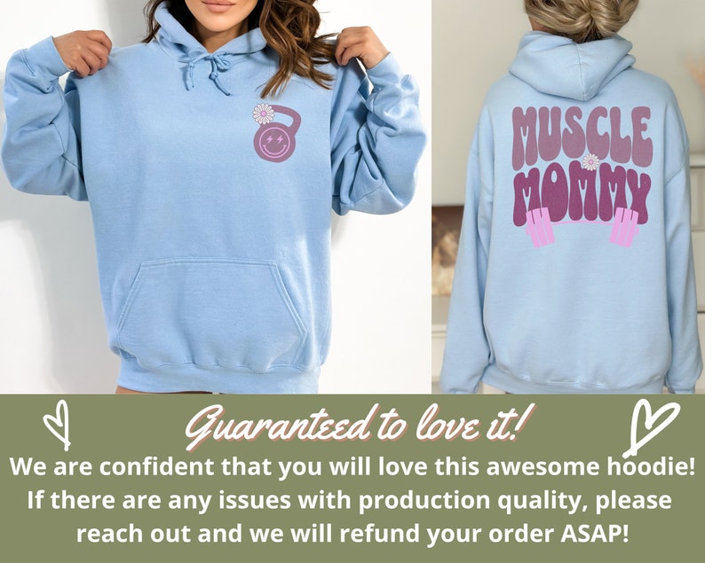 May include: Light blue hoodie with a pink and purple "Muscle Mommy" graphic on the back and a pink and purple kettlebell with a flower on the front.