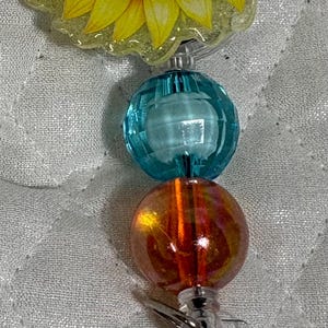 Butterflies and Daisies Badge Reel