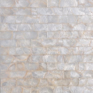 May include: White iridescent tile with a brick pattern. The tiles are made of mother of pearl and have a natural, organic look.