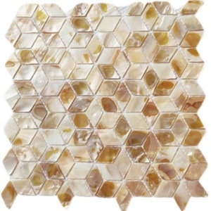 May include: A sheet of iridescent mother of pearl mosaic tiles in a geometric pattern. The tiles are a mix of white, cream, and gold colors.