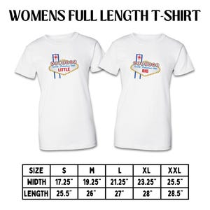 May include: Two white t-shirts with a graphic of a Las Vegas sign that reads "Welcome to the Fabulous Fam". The shirts have short sleeves and a crew neck. Size chart included.