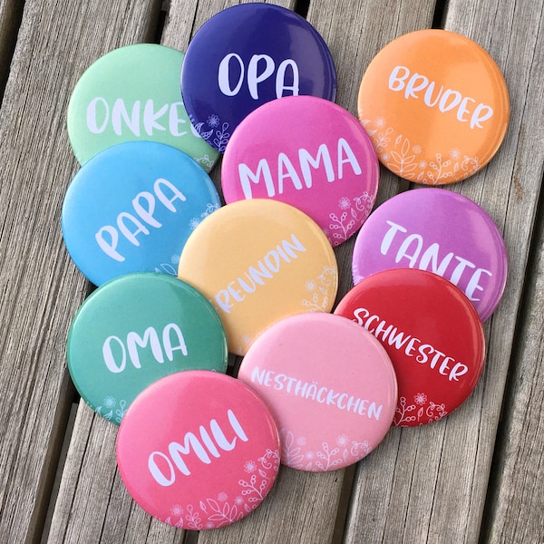 Buttons with names as table cards at the wedding or children's birthday party