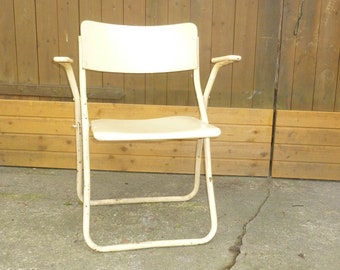 Very old doctor chair from practice to fold INDUSTRIE shabby
