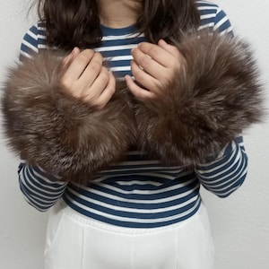 Real crystal fox fur cuffs.