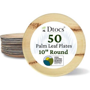 May include: A stack of 50 round, 10-inch palm leaf plates. The plates are beige and have a natural wood grain pattern. The plates are labeled "Dtocs" and "50 Palm Leaf Plates 10" Round". The label also includes a USDA Certified Biobased Product logo.