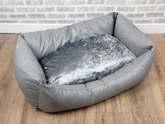 Grey faux leather dog bed with crush velvet inner cushion
