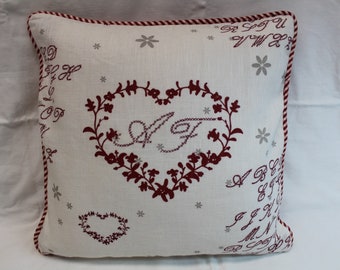 Cushion cover with cross-stitch heart