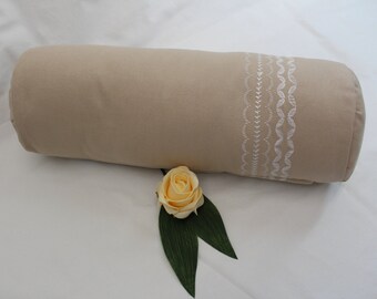 Neck roll with embroidery or rickrack trim