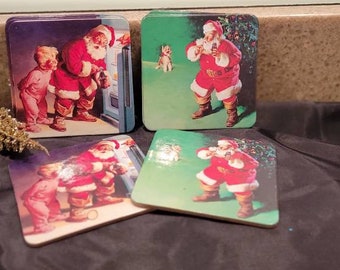 Set of 10 Christmas Coca Cola coasters. 3 1/2"