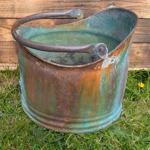 Distressed reclaimed antique copper coal bucket