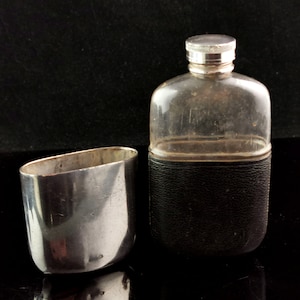 Rustic Antique silver plated and leather covered hip flask