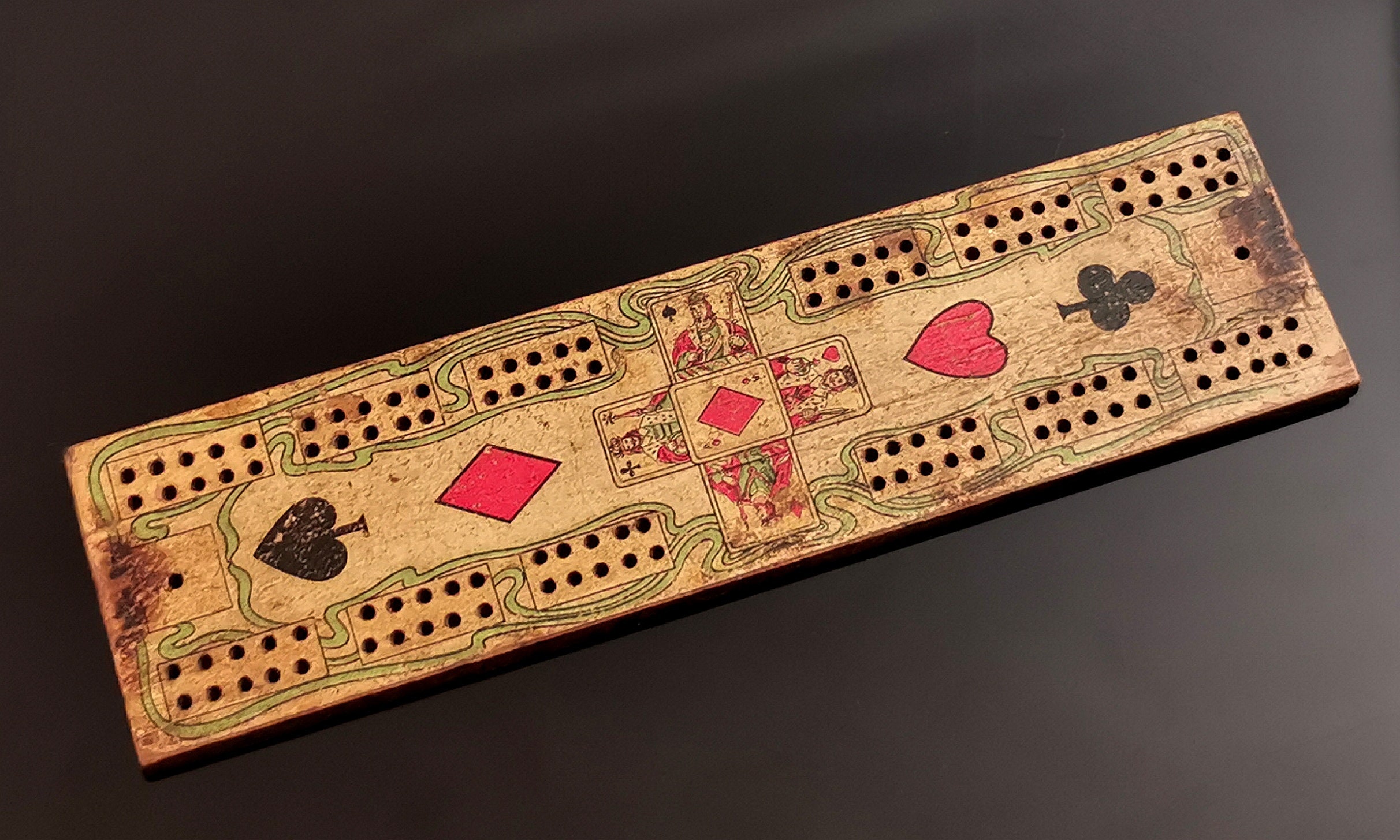 Vintage wooden cribbage board, card suits