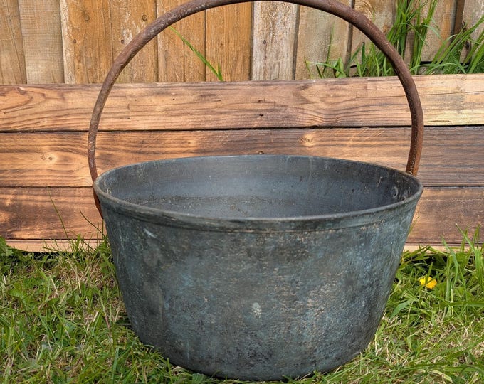 Large antique cast iron pot, planter