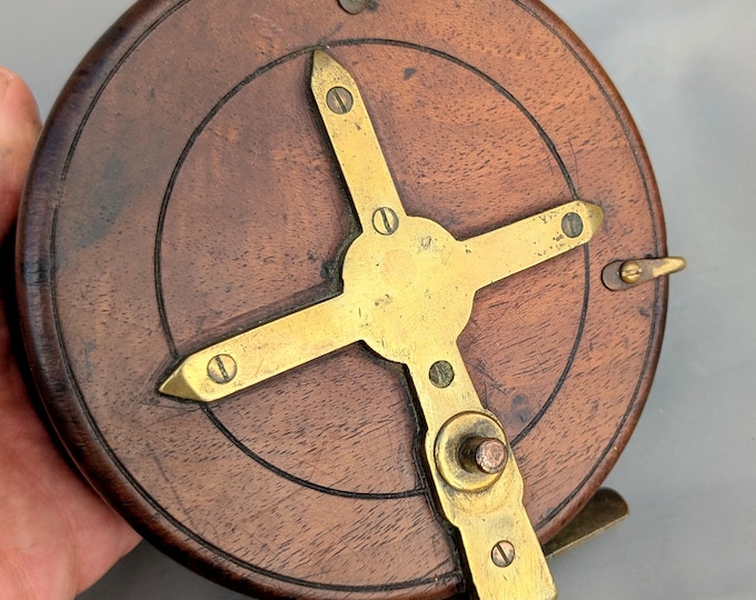Antique Nottingham style star back fishing reel, large, mahogany and brass