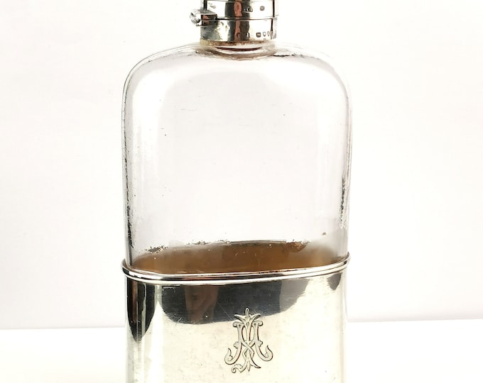Antique sterling silver cased hip flask, glass