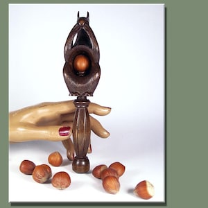Vintage antique hand-carved figural nutcracker nut press nut clamp made of wood as a squirrel for hazelnuts German folk art