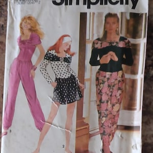 May include: Simplicity sewing pattern featuring illustrations of women's clothing designs. The designs include a pink jumpsuit, a black and white polka dot outfit, and a floral print ensemble. The pattern number is 7626.