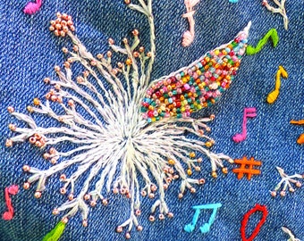 Girls size large 10/12 est 1989 Place embroidered denim jean jacket. Dandelion musical note design with beading detail. One of a kind design