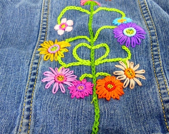 Hand embroidered little boho hippie flower baby jean jacket. Size 3T. One of a kind design. Floral embroidered front & back.