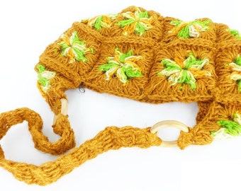 Sweet little handcrafted crocheted brown and green yarn boho hippy bag. Perfect little weekend beach bag.