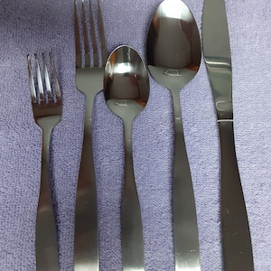 89 piece service for 12 Cambridge Madison Satin stainless flatware set