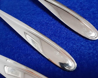 69 piece service for 8 vintage stainless Cosmos flatware set