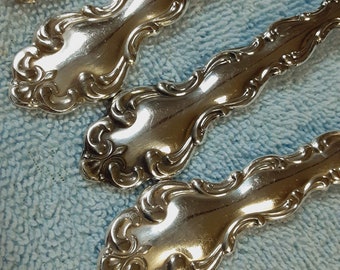 48 piece service for 8 Oneida Modern Baroque silverplate flatware, silverware