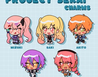 May include: Five colorful cartoon character charms featuring the text "PROJECT SEKAI CHARMS". The characters are Mizuki, Saki, Akito, Rui, and Airi.