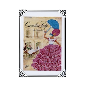 May include: Vintage book cover titled "Crinoline Lady in Crochet" featuring an illustration of a woman in a ruffled magenta dress and a blue parasol. The background shows a carriage and figures in a courtyard. The price is 10¢.
