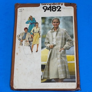 May include: Vintage Simplicity sewing pattern 9482. The pattern features a woman wearing a plaid coat and skirt. The pattern cover has a brown border and the text "Simplicity" and "9482". The size is 12.