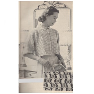May include: A vintage, cropped, short-sleeved sweater with a collared neckline and button closure. The sweater has a textured knit pattern. The image is in monochrome, and the sweater is paired with a skirt and a small purse.