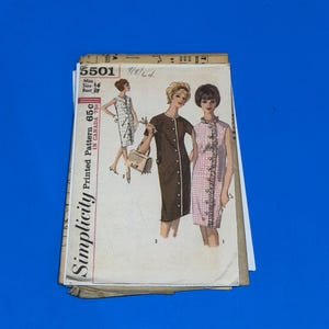 May include: Vintage Simplicity printed sewing pattern, style 5501, featuring illustrations of three dresses. The pattern includes measurements for a Miss size 16 with a 39-inch bust. The pattern is from Canada.