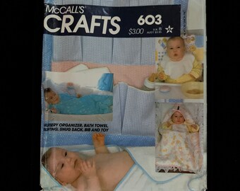 UNCUT McCalls Crafts 603 or 8112 - Nursery Organizer, Bath Towel, Bunting, Snug Sack, Bib and Toy Sewing Pattern - Size Sm, Med.