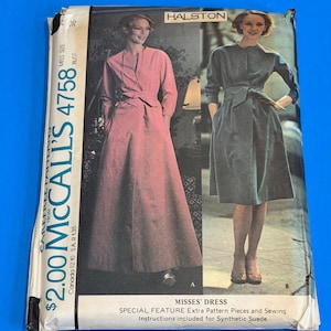 May include: A McCall's 4758 sewing pattern envelope for a Halston dress. The front shows two variations: a long pink dress and a knee-length blue dress, both with long sleeves, a belted waist, and a high neckline. Text includes "MISSES' DRESS" and "Synthetic Suede".