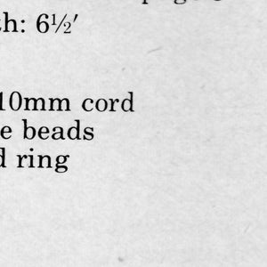 May include: Text listing materials for a craft project. Includes: 101 yards of cord, 12 large hole beads, a 2-inch welded ring, and pots of 8, 10, and 12 inches. The finished length is 6 1/2 feet.