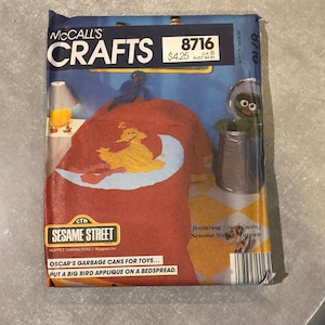 McCall&#39;s Crafts 8716 Sewing pattern Sesame Street  Big Bird Applique bedspread, Oscar garbage can - toy chest / hamper Uncut