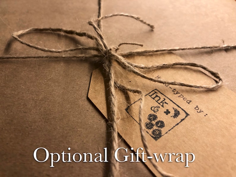 May include: A brown paper package tied with twine and a brown paper tag. The tag has a black stamp that says "Ink & Co. Hand-typed by..." and the text "Optional Gift-wrap" is printed below the package.