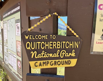 Quitcherbitchin National Park Sign