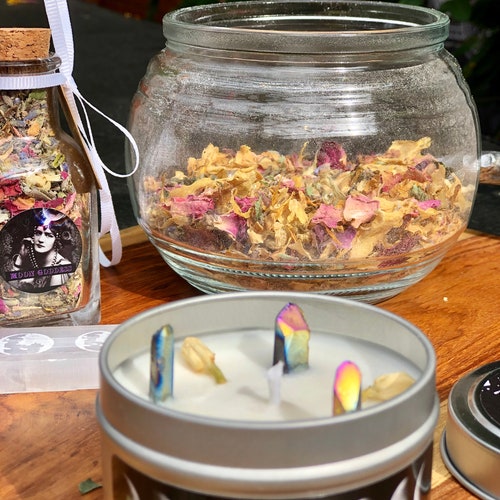 Moon Goddess crystal candle made with non GMO coconut & soy wax, rainbow crystals and dried jasmine flowers.