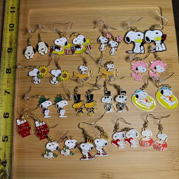 Peanuts Snoopy Dog enamel dangle earrings.Listing #1 of 4 Sorry no international shipping from this shop. This includes Canada.